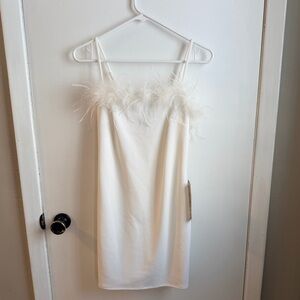 B Darlin white feather dress.